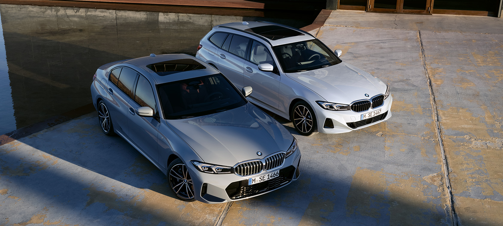 Front view BMW 3 Seeries Sedan G20 BMW 3 Series Sedan G20 Mineral white front view in the mountains