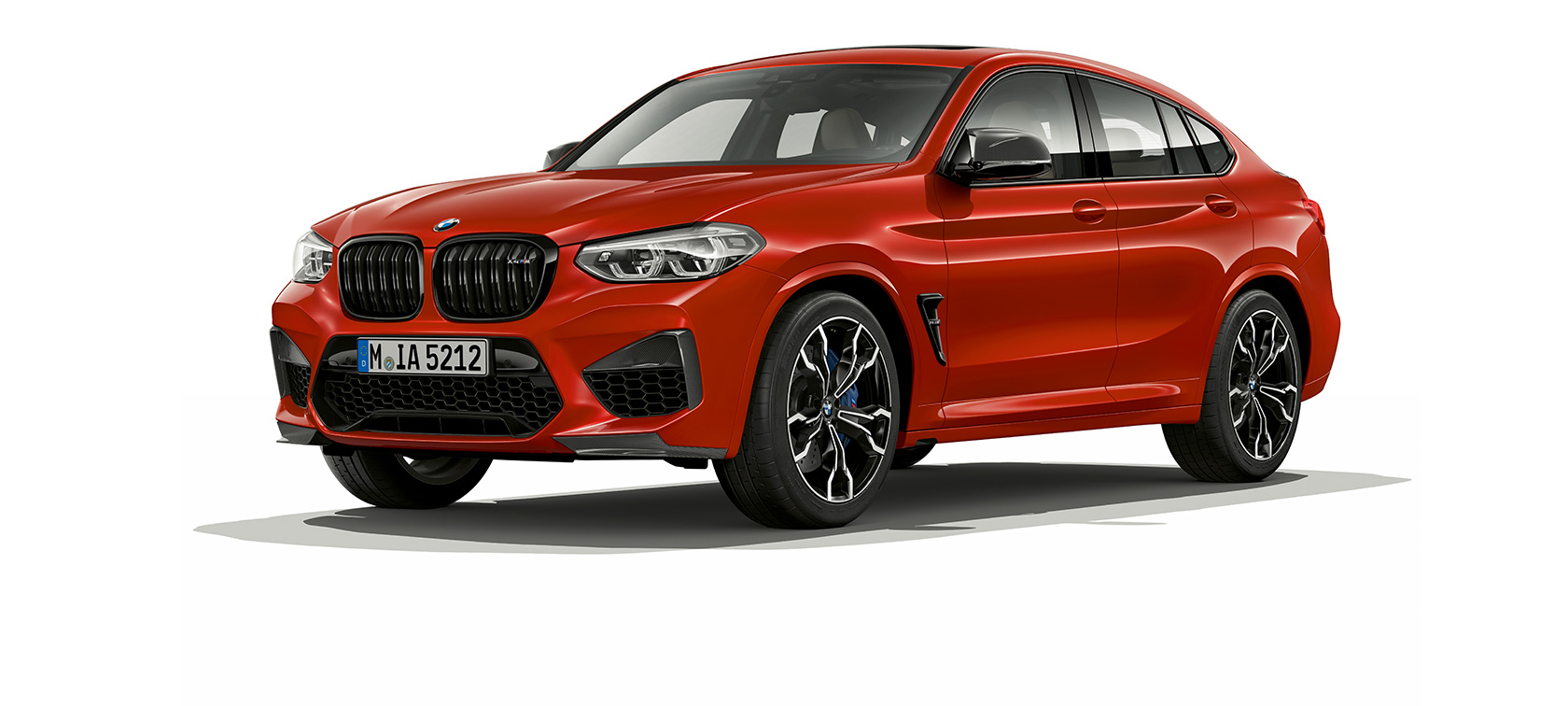 BMW X4 M Competition, Dreiviertel-Seitenansicht. BMW X4 M Competition in Toronto Rot metallic, Exterieur, Dreiviertel-Seitenansicht.